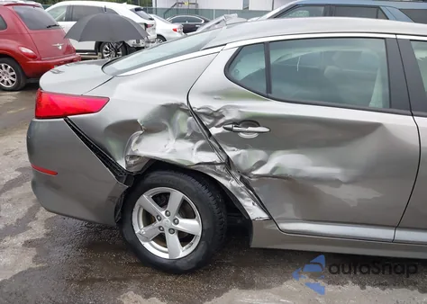 2015 Kia Optima Lx z USA, uszkodzony, nr VIN 5XXGM4A7XFG494669